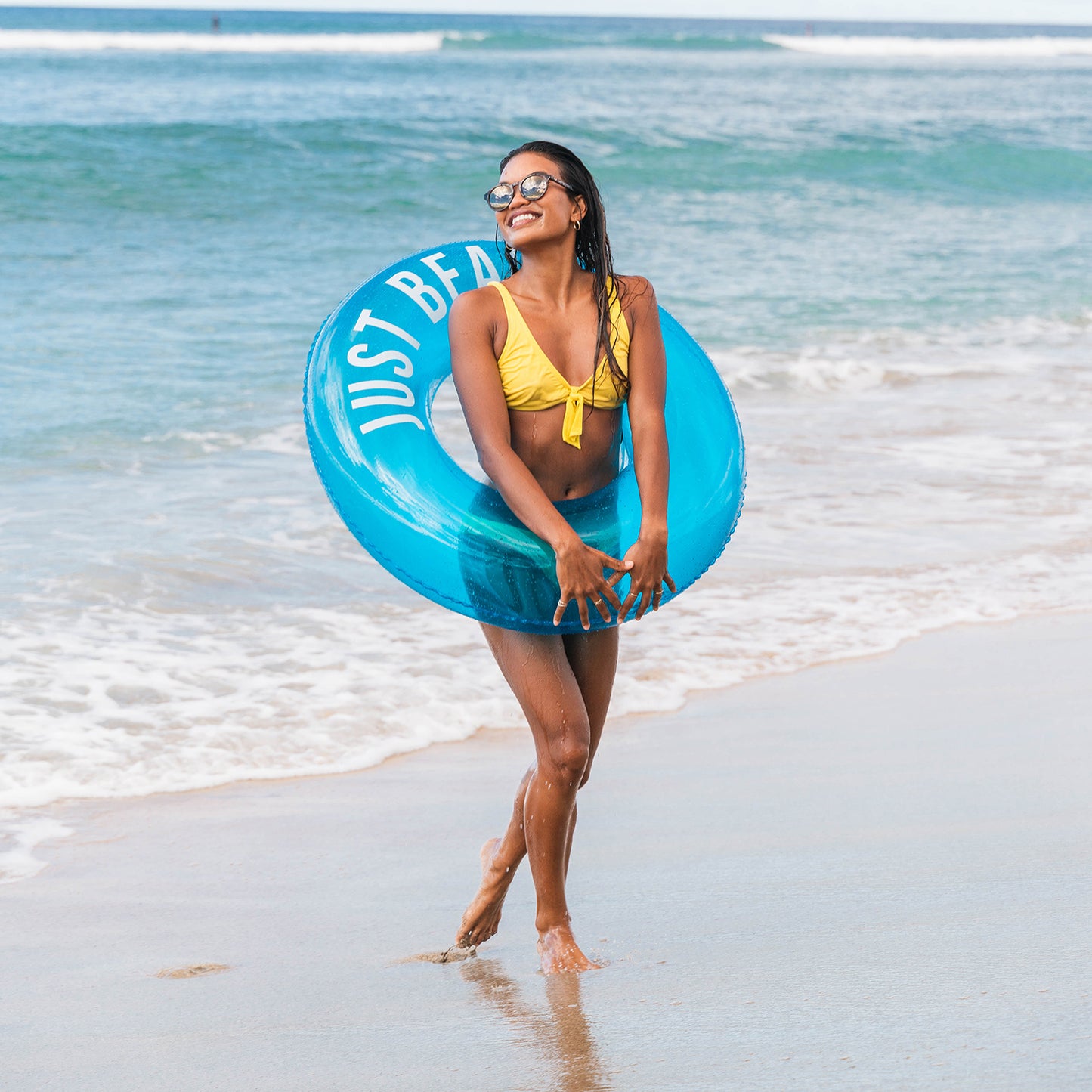 Experience endless fun in the sun with the Sweet Shop Blue Raspberry Inflatable Pool Tube - a durable, comfortable, and versatile swim ring for all ages.